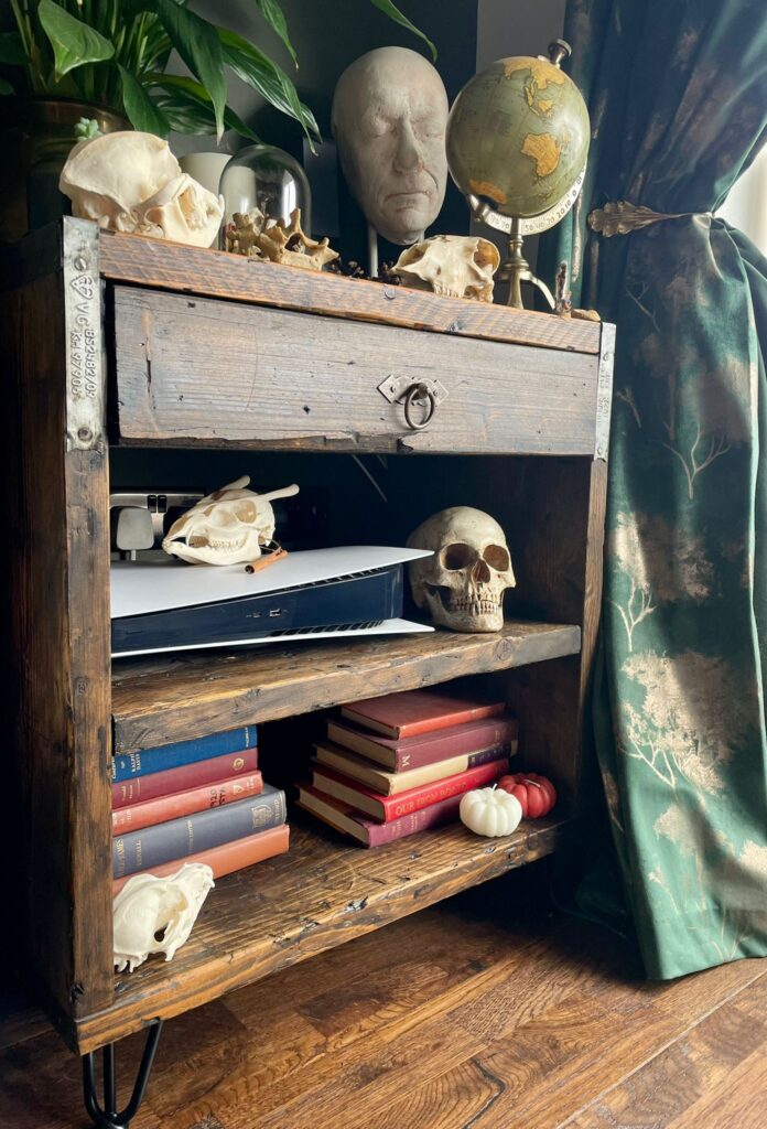 Rustic reclaimed wood shelving unit with industrial metal accents